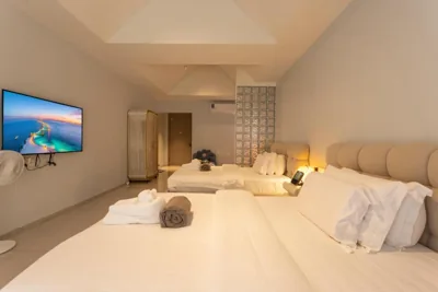 Chambre Double Deluxe avec deux lits doubles — YUSU Hotel 羽宿酒店